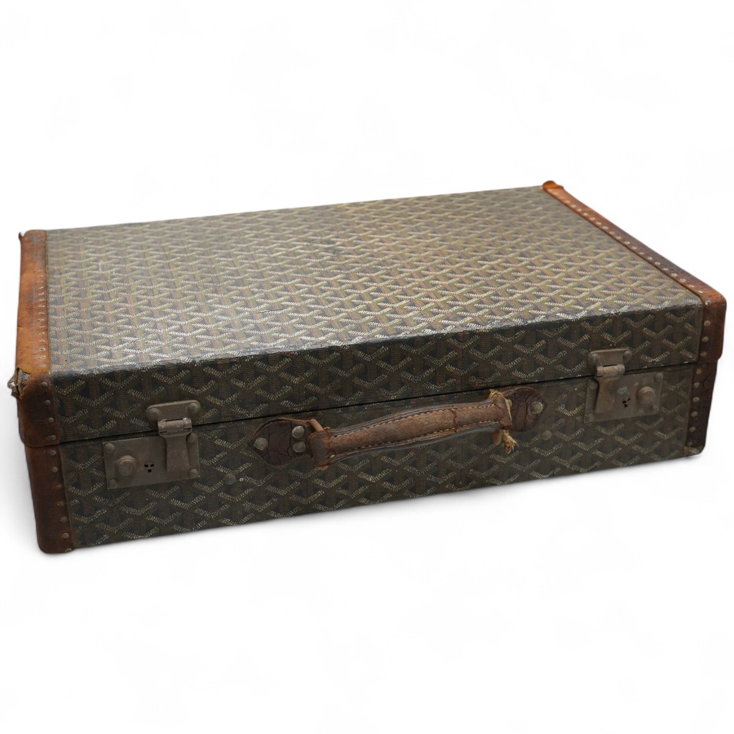 A vintage Malles Goyard suitcase with all over printed design, applied metal label to the exterior, height 13cm, width 49cm, depth 30cm